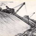 15634